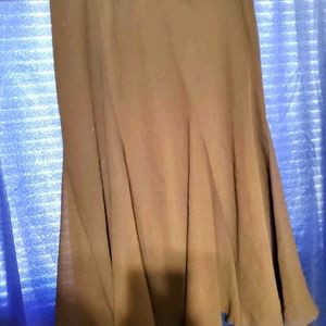 A beautiful calf length brown skirt